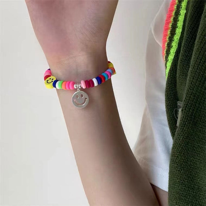 Handgefertigte elastische Armbänder im Regenbogen-Smiley-Stil