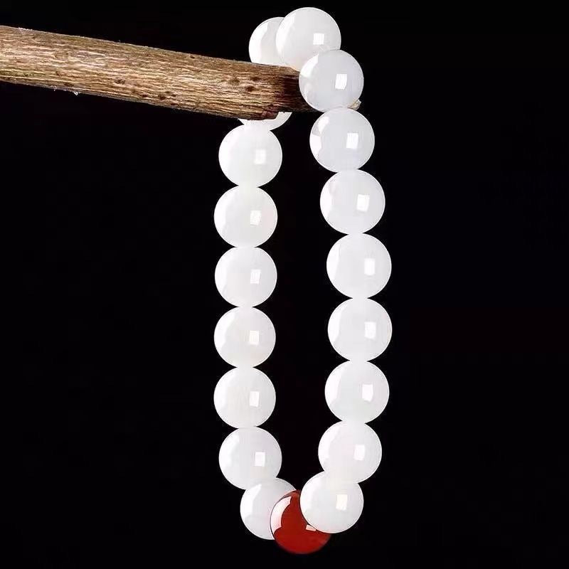 Bracelets artistiques simples en perles rouges de jade blanc