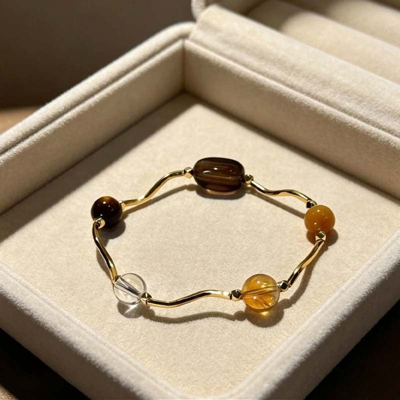 Women's Saturn Yellow Tiger Eyes Black Gold Bracelet