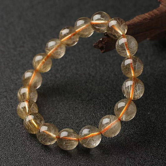 Bracelets en titane et quartz rutilé en cristal naturel et or