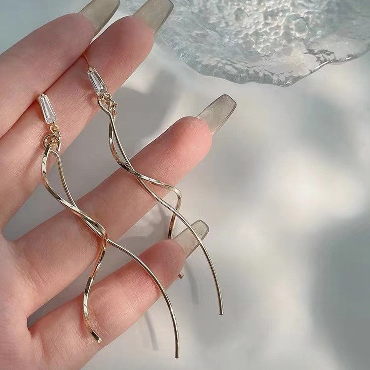 Women's Elegant Long Tassel Mosquito Coil Show Face Small Earrings