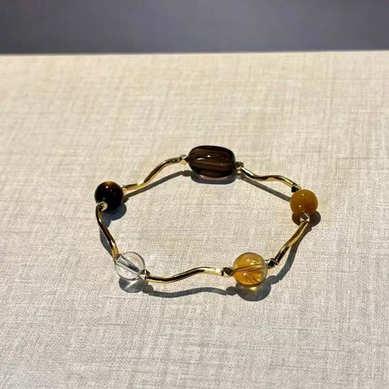 Women's Saturn Yellow Tiger Eyes Black Gold Bracelet