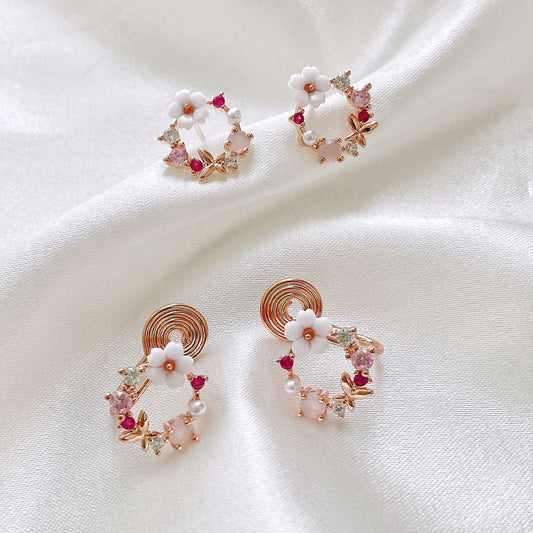 Boucles d'oreilles moustiques à fleurs blanches en zirconium rose frais