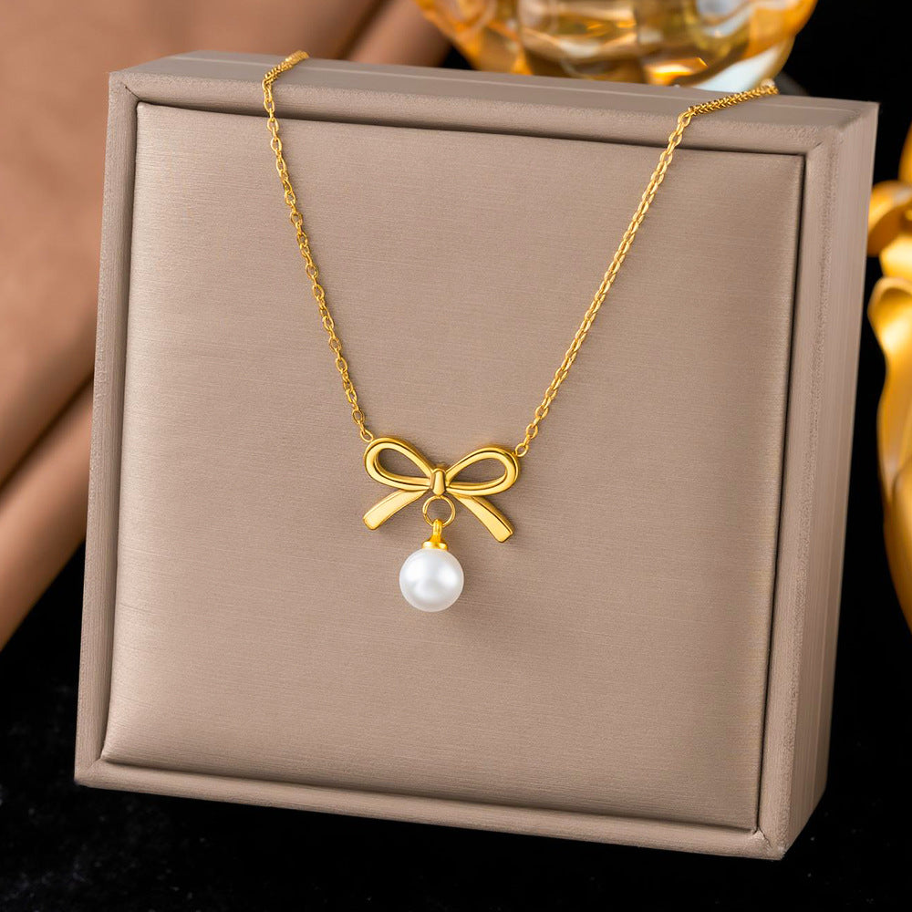 Women's Fashion Stainless Steel Bow Pearl Indian Earrings