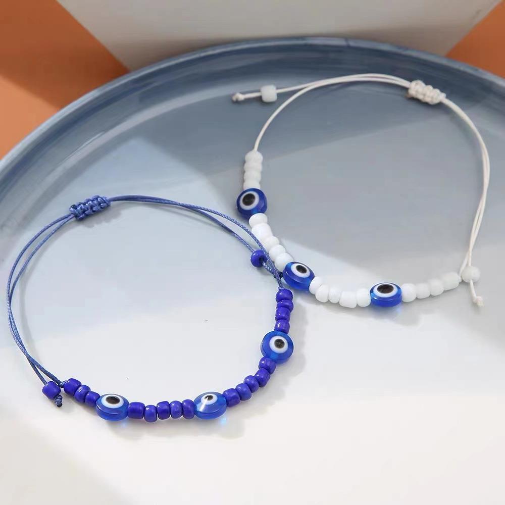 Bracelets tissés réglables en deux pièces aux yeux bleus bohèmes