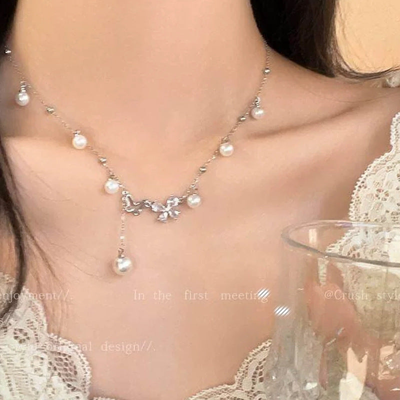 Women's Pearl Butterfly Tassel Sweater Light Luxury Clavicle Necklace