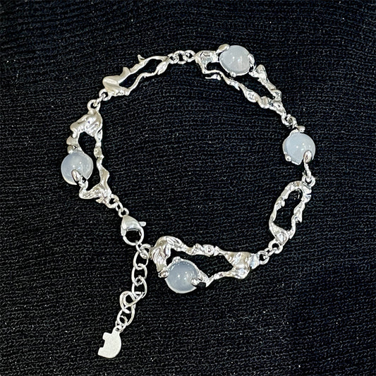 Bracelets de perles incrustés d'agate blanche de conception de pierre de lune en acier titane