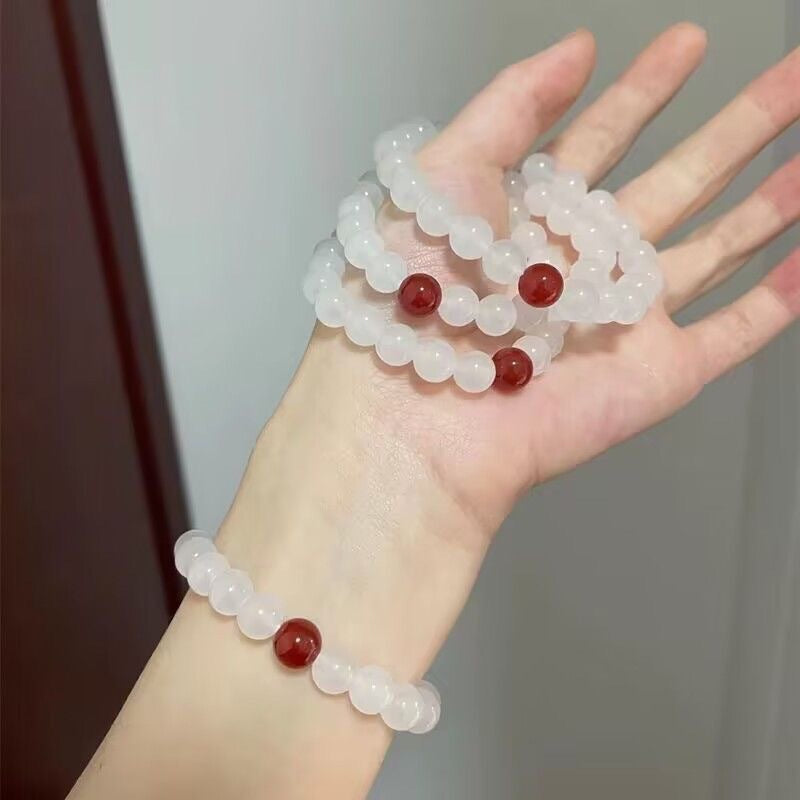 Bracelets artistiques simples en perles rouges de jade blanc