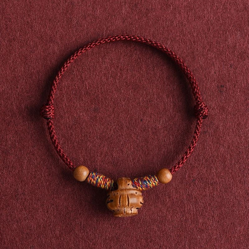 Women's & Men's Peach Wood Pit Red Rope Surprise Born Adult Bracelet