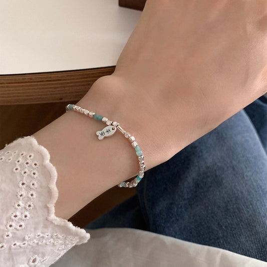 Bracelets de luxe légers et exquis avec étiquette de poisson sûre pour femmes