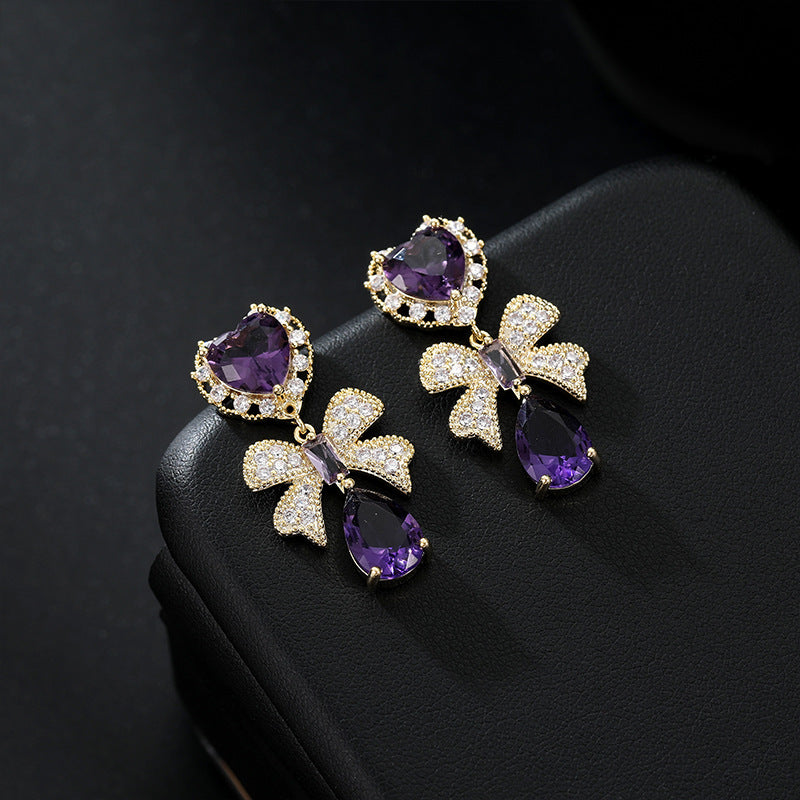 Boucles d'oreilles violettes élégantes et nobles avec nœud en diamant pour femme