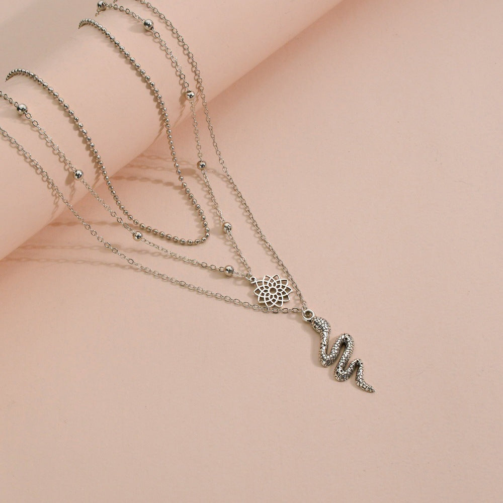 Women's Fashion Vintage Alloy Lotus Snake Pendant Necklaces