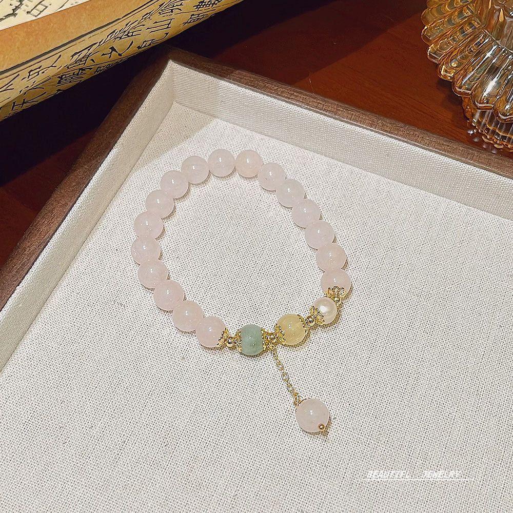 Bracelets à quartz fraise gracieux de luxe pour femmes