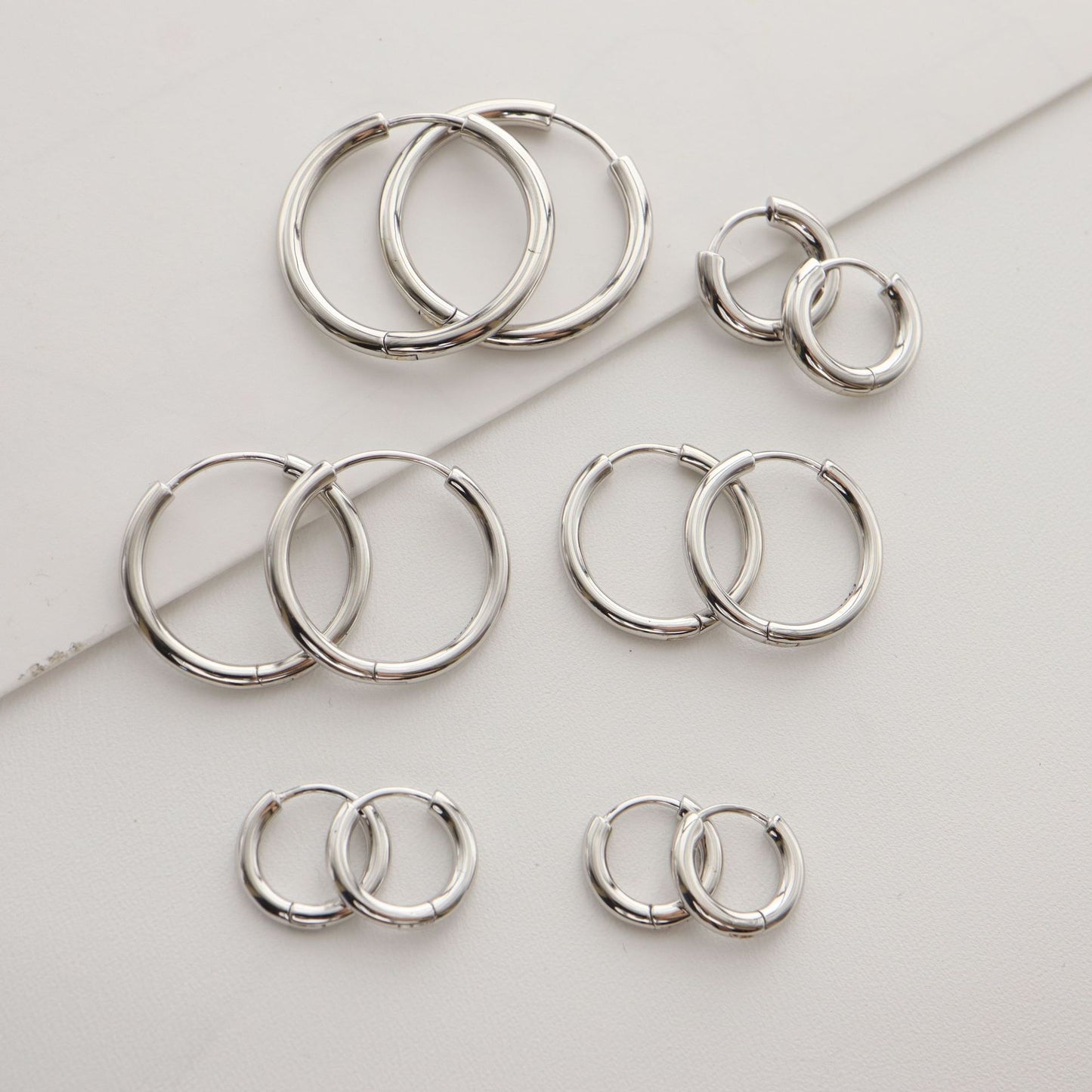 Women's & Men's Eardrop Sier Round Solid Niche Seaside Rings
