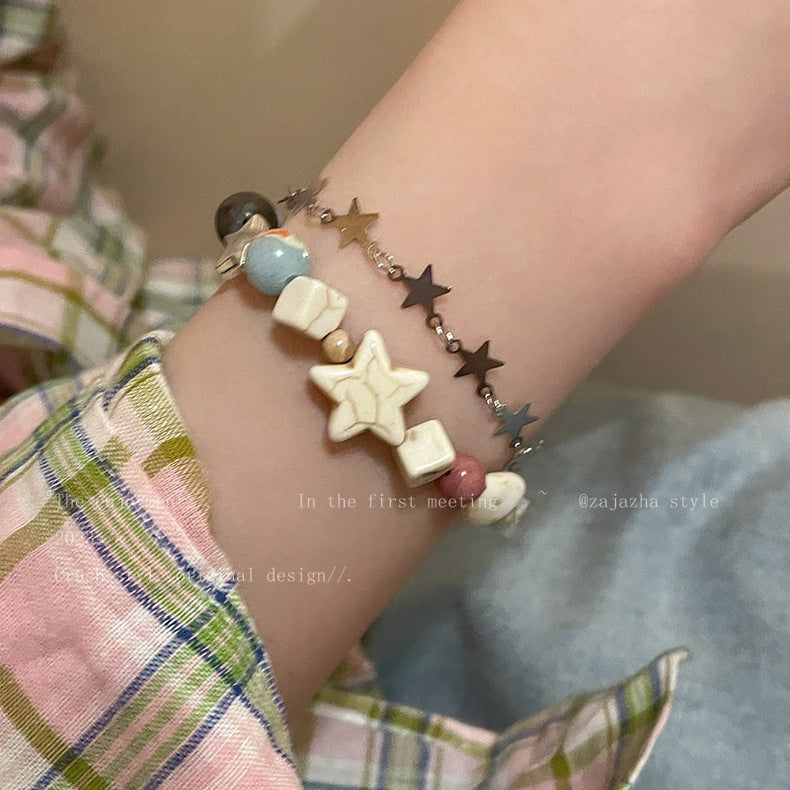 Bracelets doubles couleur crème étoile Pluto Fans