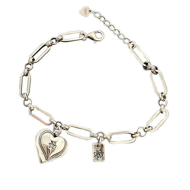 Bracelets de simplicité de personnalité polyvalente de coeur rétro de mode des femmes