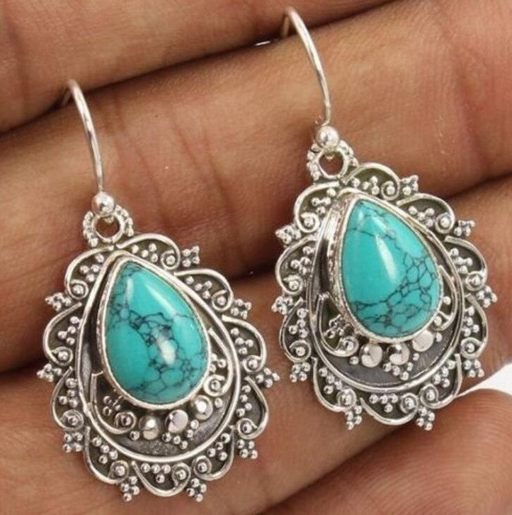 Inlaid Sea Blue Topaz Female Creative Rotational Water Drop Earrings