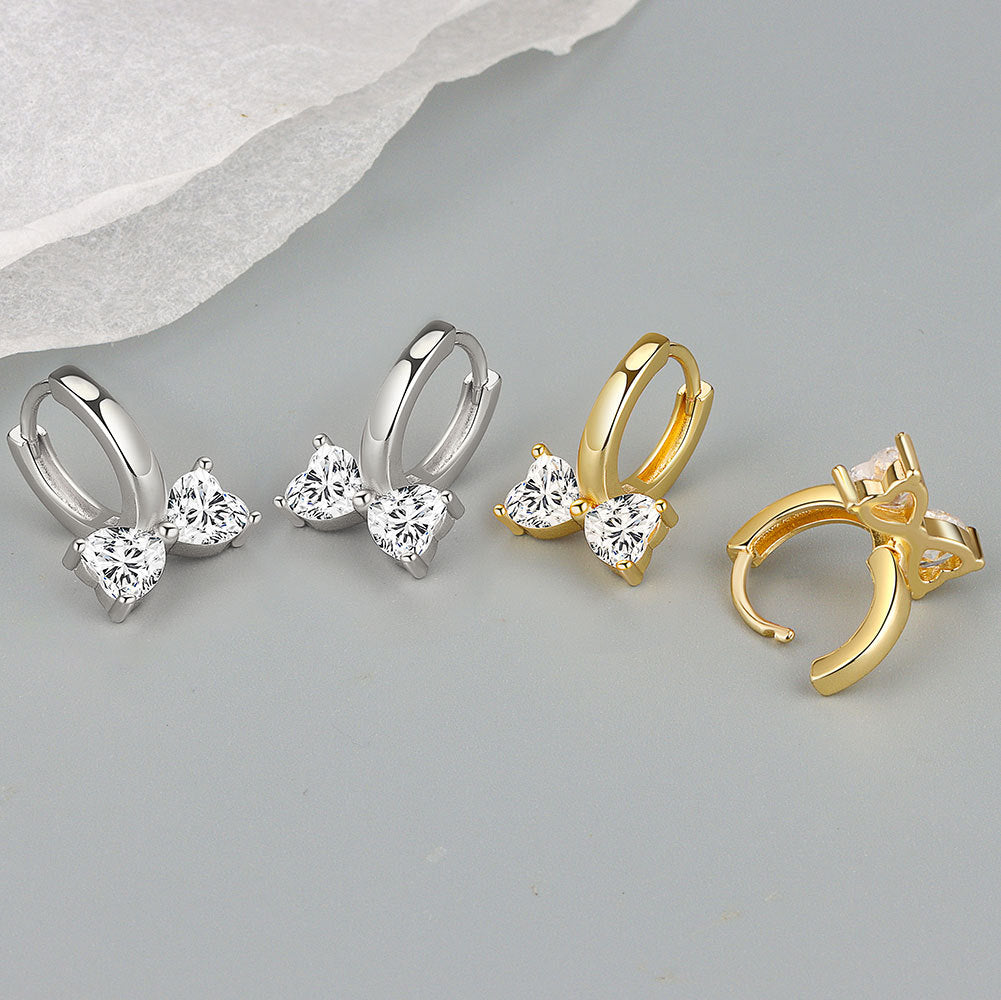 Petites boucles d'oreilles de niche en zircon incrusté de cuivre et nœud