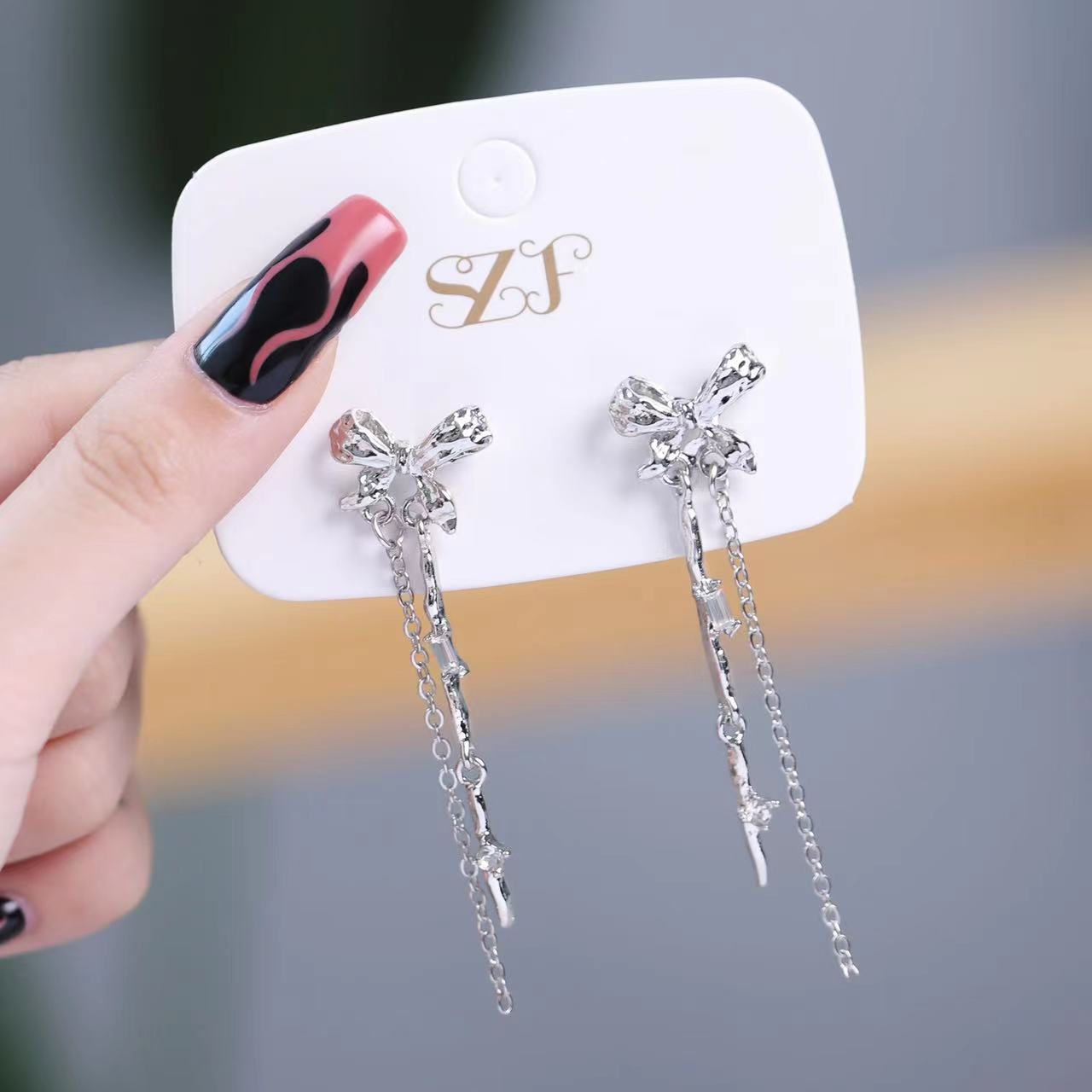 Metal Sier Liquid Wings Zircon Light Diamond Earrings