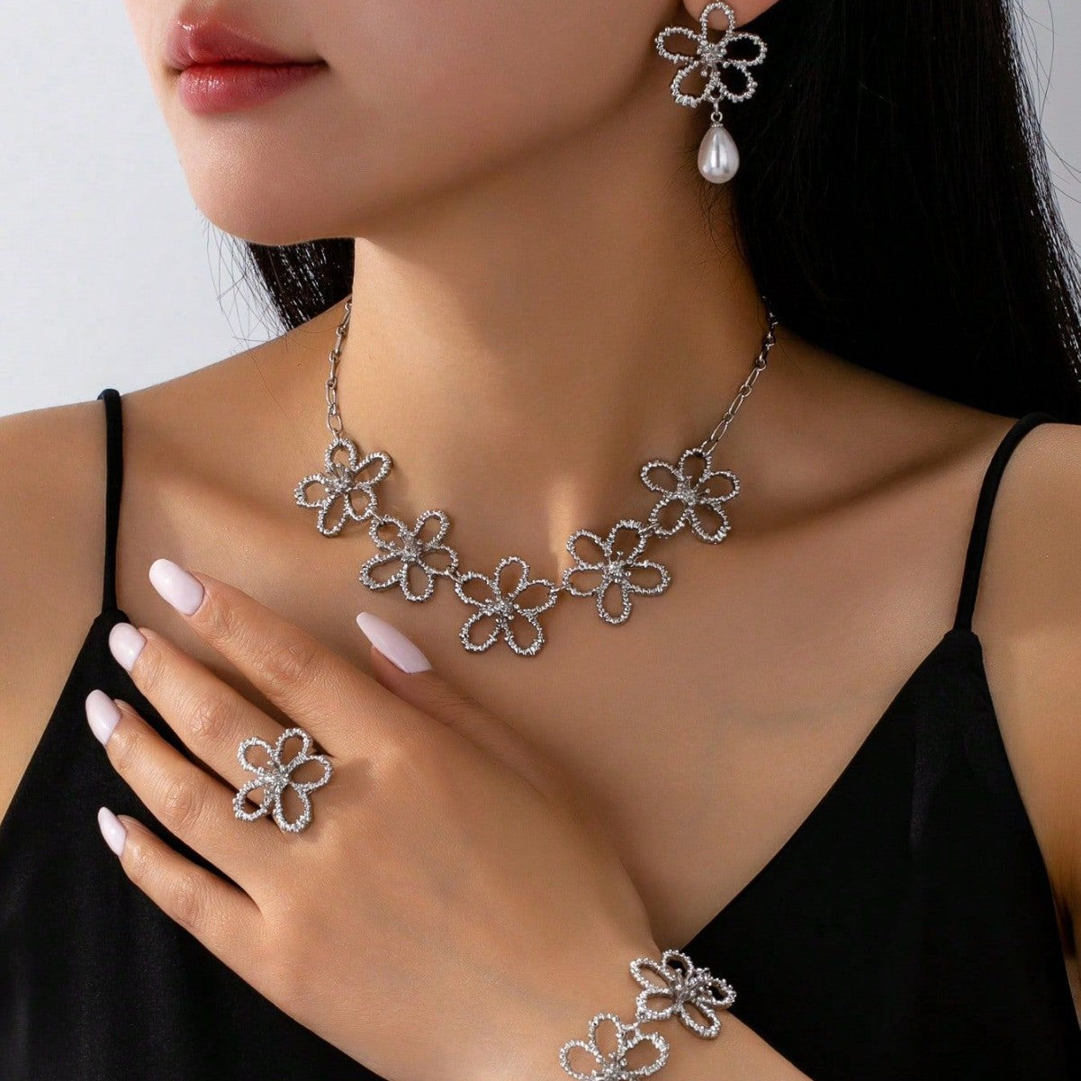 Fashion Metal Hollow Flower Stitching Ear Female Light Luxury Jewelry Set