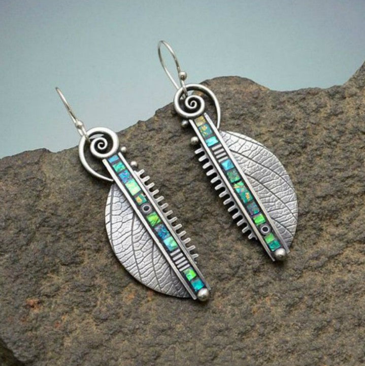 Inlaid Sea Blue Topaz Female Creative Rotational Water Drop Earrings