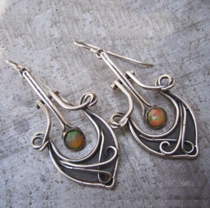 Inlaid Sea Blue Topaz Female Creative Rotational Water Drop Earrings