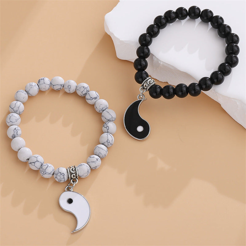 Yin und Yang Klatsch runde Paar-Freunde-Armbänder