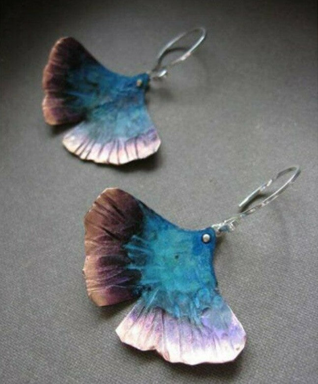 Inlaid Sea Blue Topaz Female Creative Rotational Water Drop Earrings