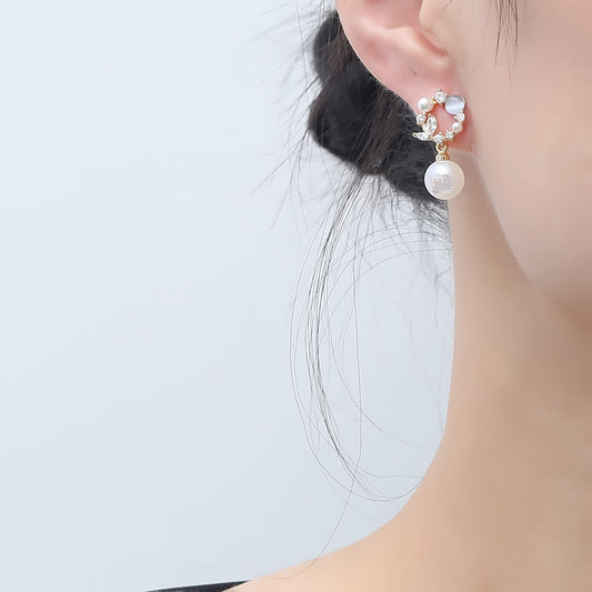 Boucles d'oreilles en forme de guirlande de perles, douces et élégantes, de haute qualité