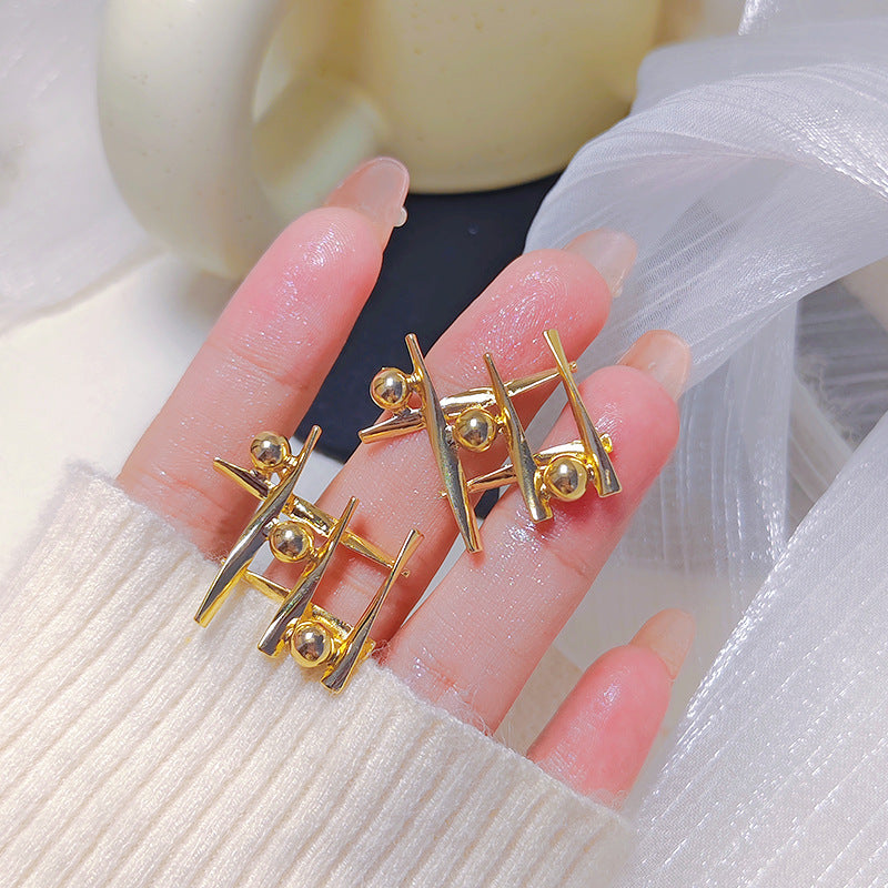 Cross Design Sense Small Golden Balls Earrings