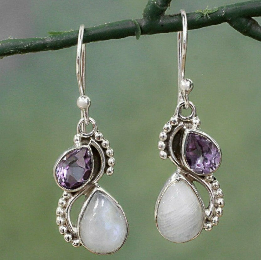 Inlaid Sea Blue Topaz Female Creative Rotational Water Drop Earrings