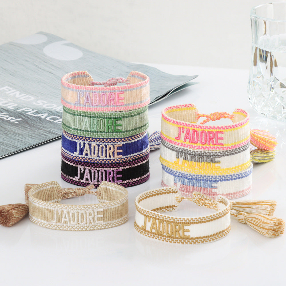 Handarmbänder mit besticktem Buchstabenband und Tragegurt für Damen