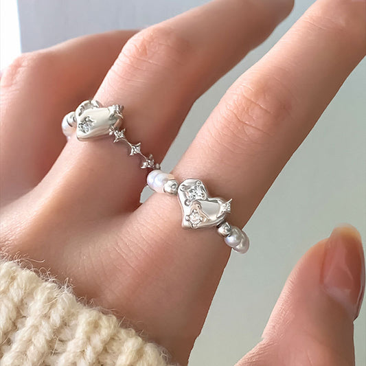 Bagues exquises en petits diamants avec couture de perles d'amour