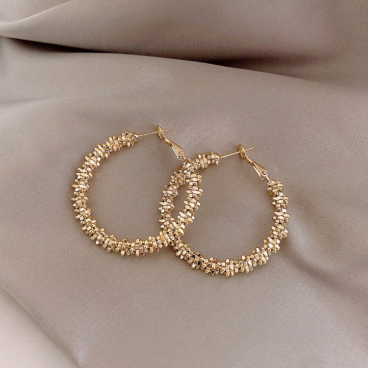 Boucles d'oreilles hautes de personnalité gracieuse de style féminin de cercle