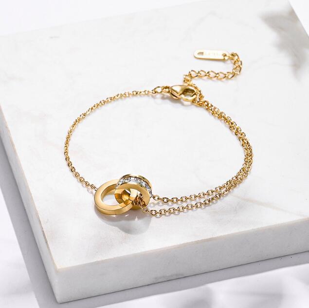 Women's Roman Font Titanium Steel Gold Design Light Bracelets