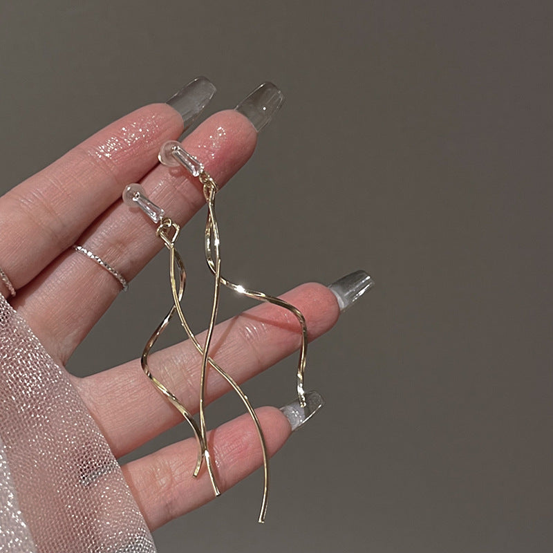 Women's Elegant Long Tassel Mosquito Coil Show Face Small Earrings