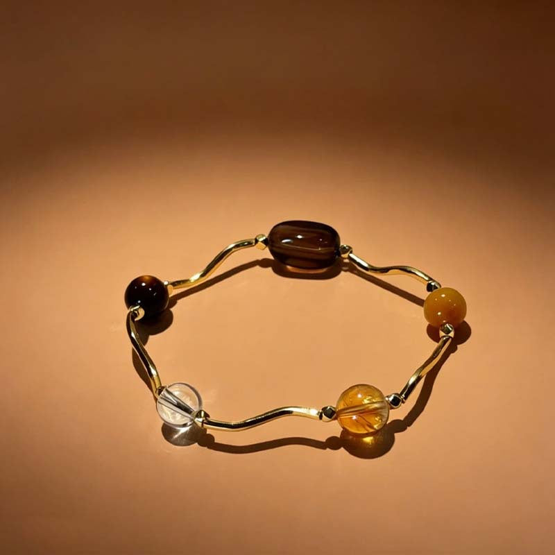 Women's Saturn Yellow Tiger Eyes Black Gold Bracelet