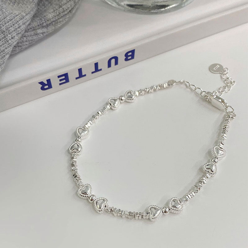 Bracelets en petites pièces avec nœud en argent sterling